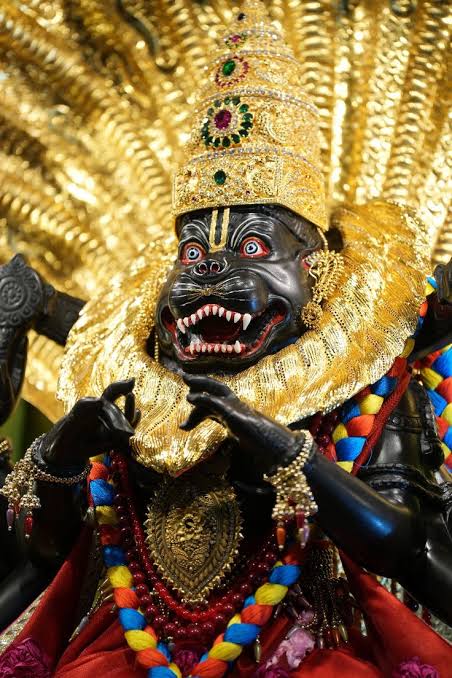 Lord Narasimha protecting devotee Prahlada - Sri Narasimha Kavacham lyrics